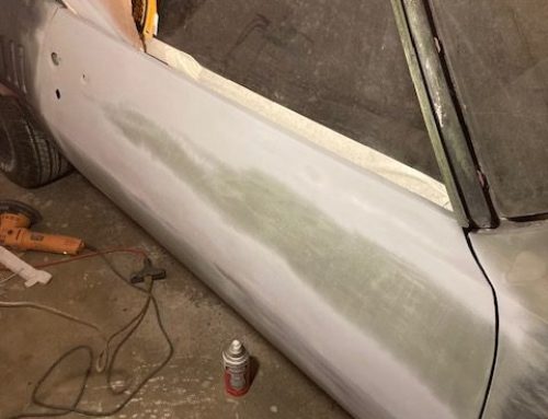 Spraying passenger door with filler primer