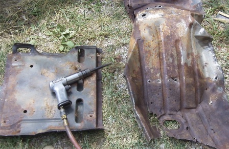 Removing the Firebird muscle car's seat support on the floorboard.